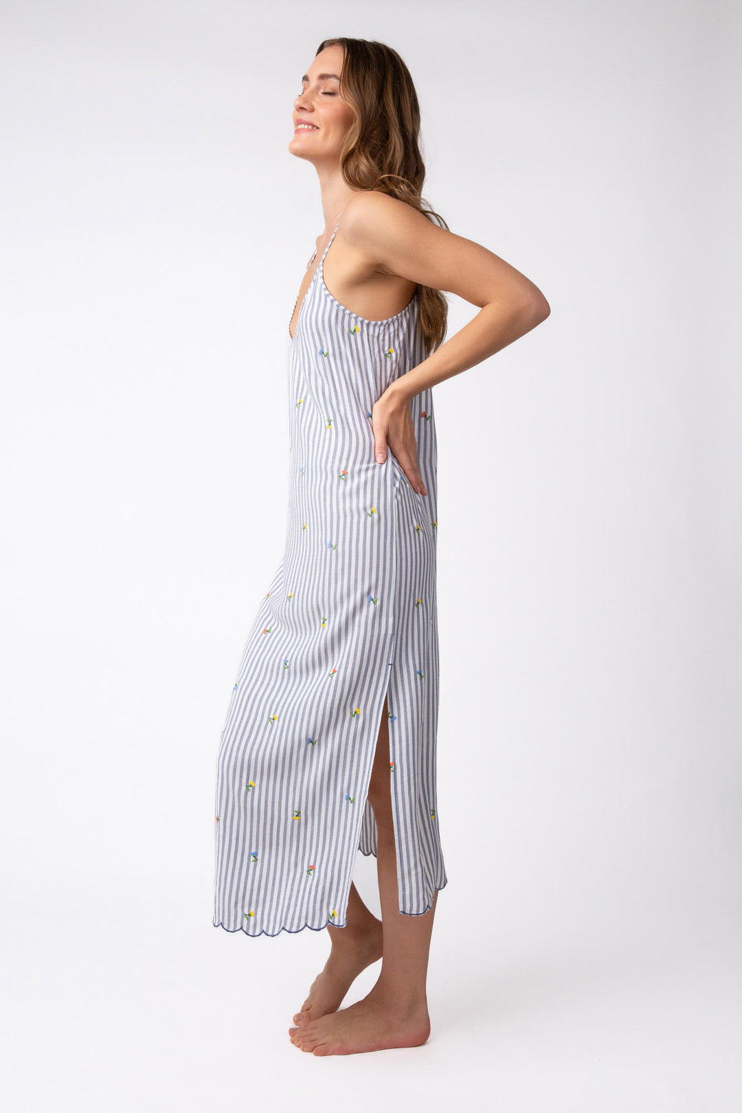 Button-up nightshirt in yarn-dye striped woven with mini embroidered flowers. Scalloped hem.