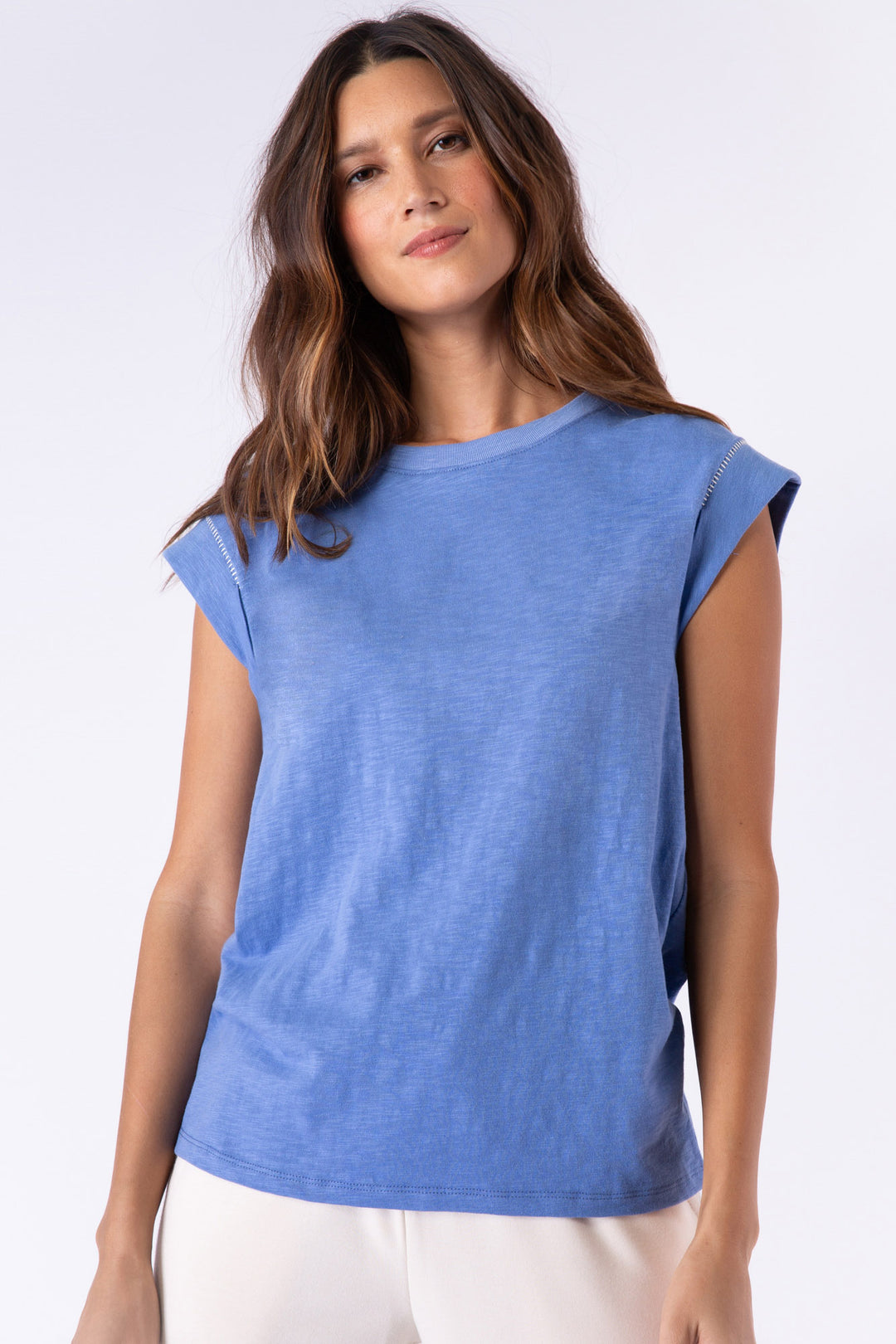 Navy blue cotton-blend short sleeve t-shirt with multi-color whipstitching at sleeves.