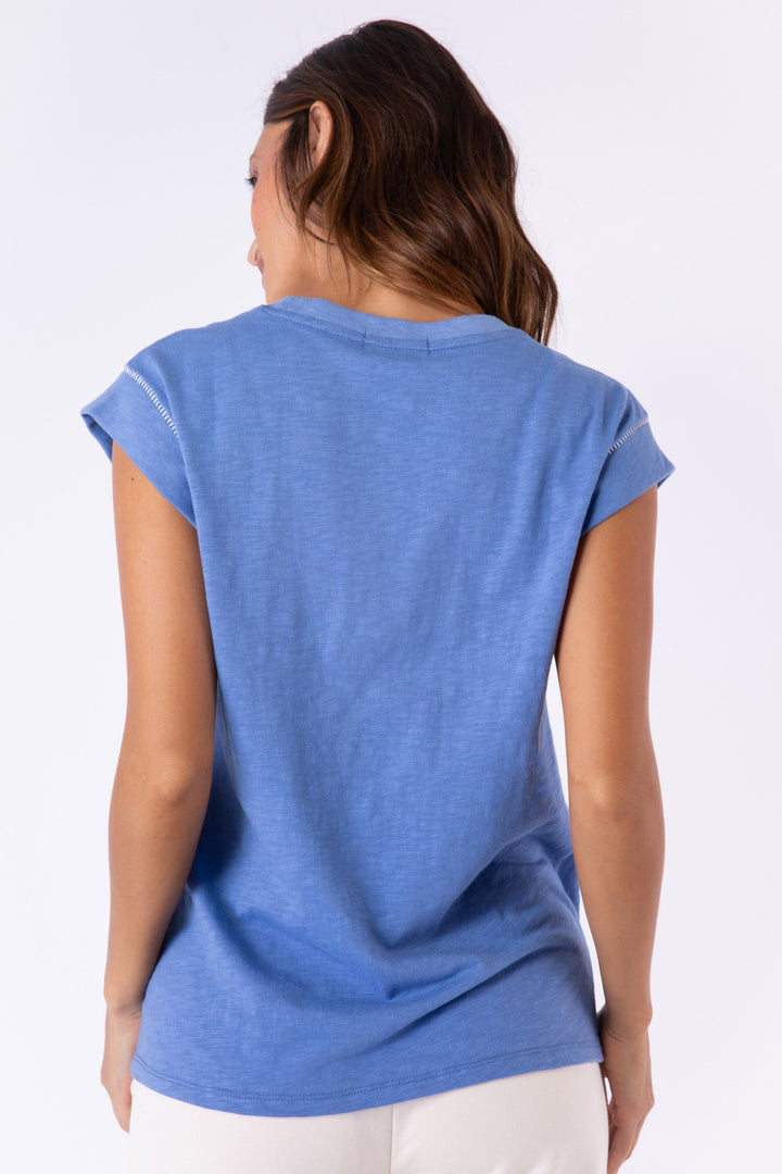 Navy blue cotton-blend short sleeve t-shirt with multi-color whipstitching at sleeves.