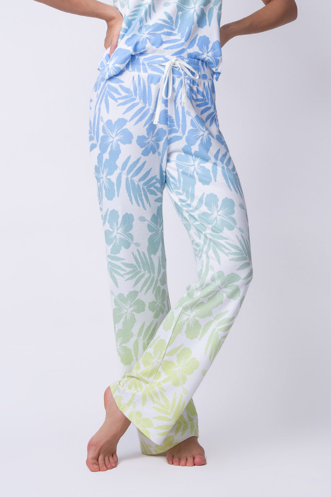 Women's straight leg lounge pant in ivory-blue-green tropical with tie waist.