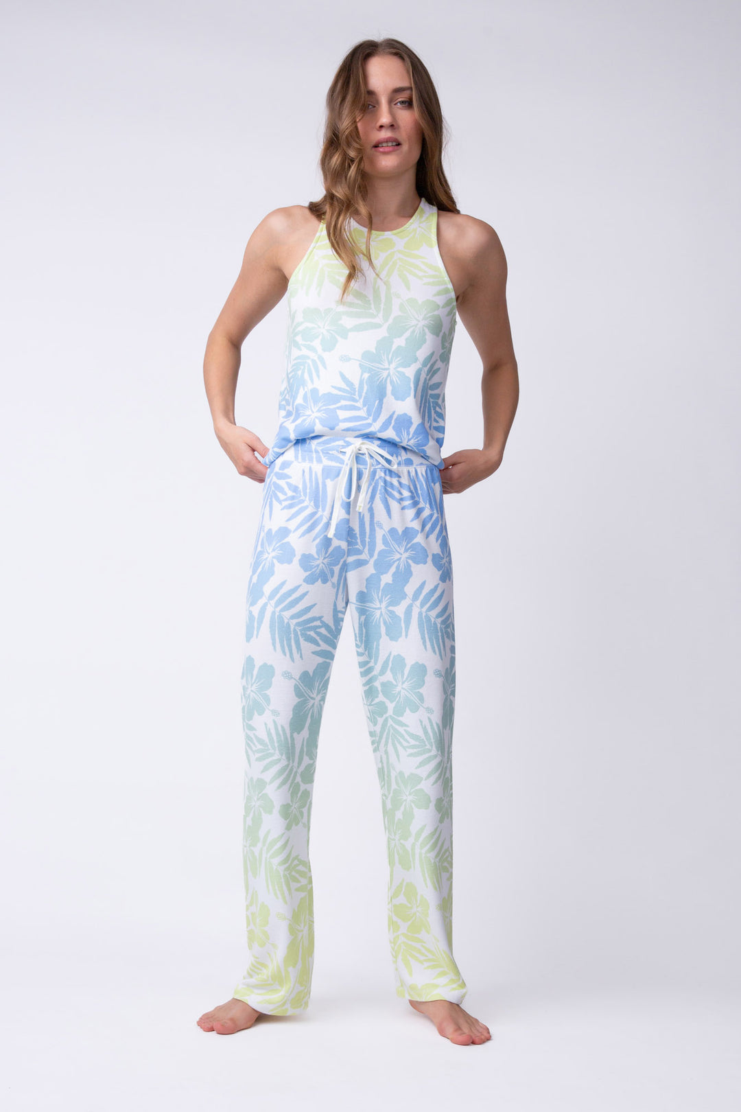 Women's straight leg lounge pant in ivory-blue-green tropical with tie waist.