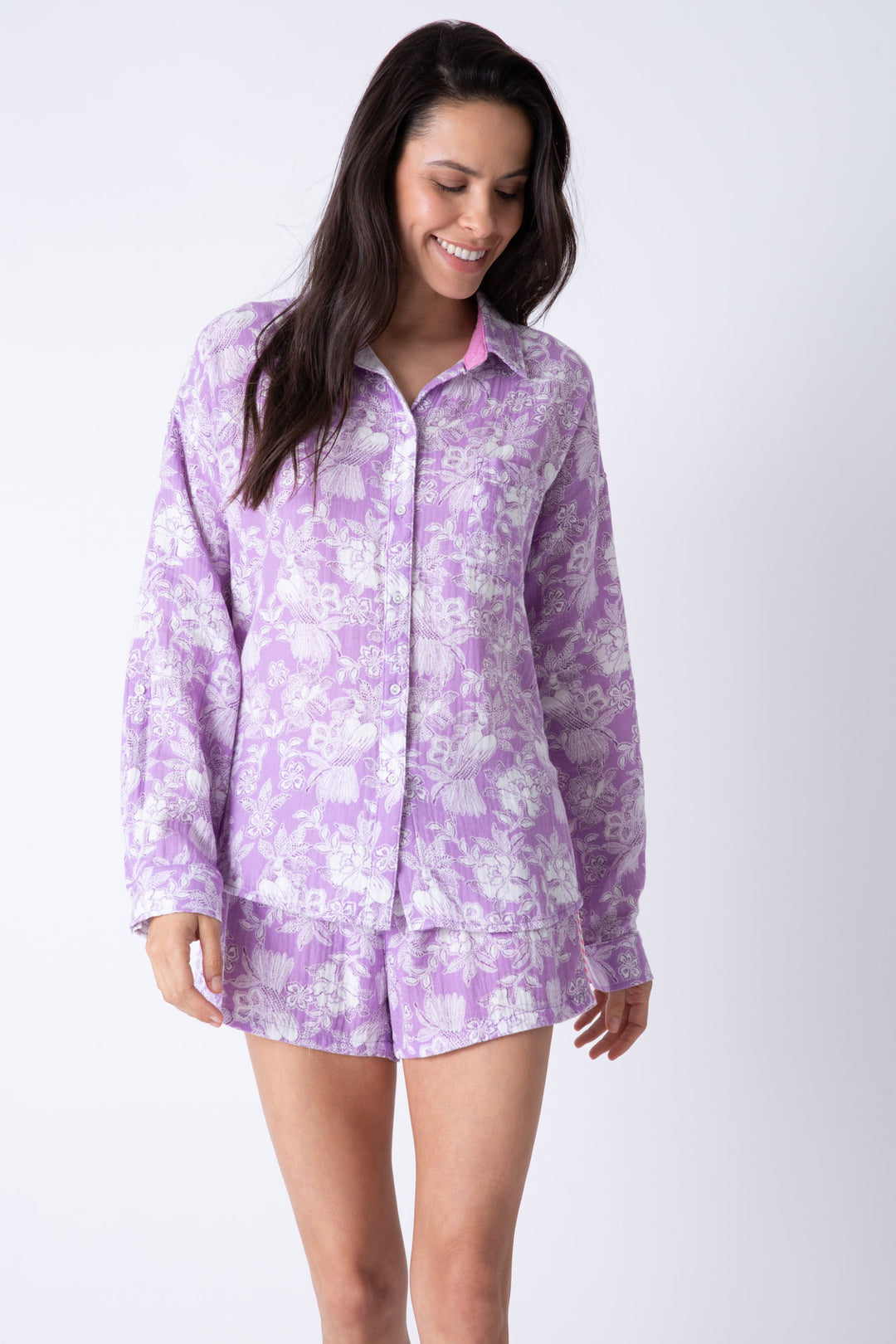 Cotton gauze women's button-down collared shirt in pale purple floral.
