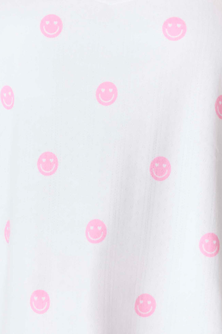 Women's ivory camisole top with pink happy face pattern. Adjustable straps. Exclusive PJS x Susan G Komen style.