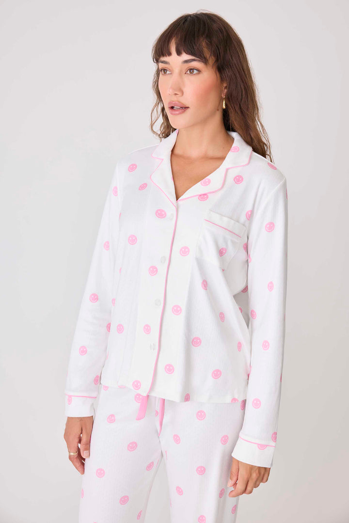 Women's ivory pajama top with pink happy face pattern. Exclusive PJS x Susan G Komen style.