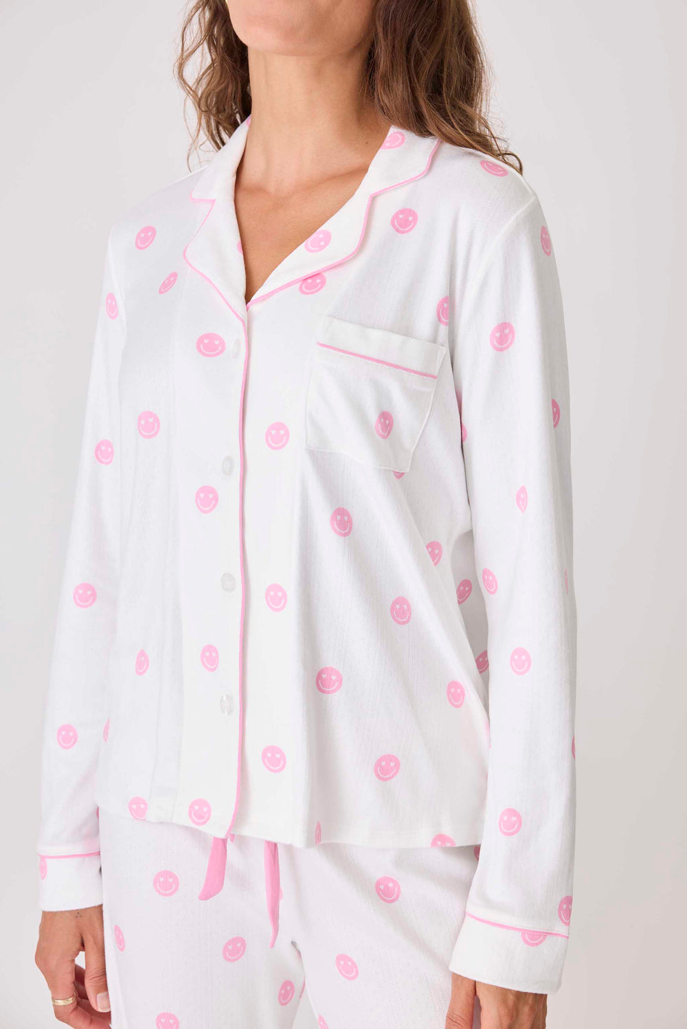 Women's ivory pajama top with pink happy face pattern. Exclusive PJS x Susan G Komen style.