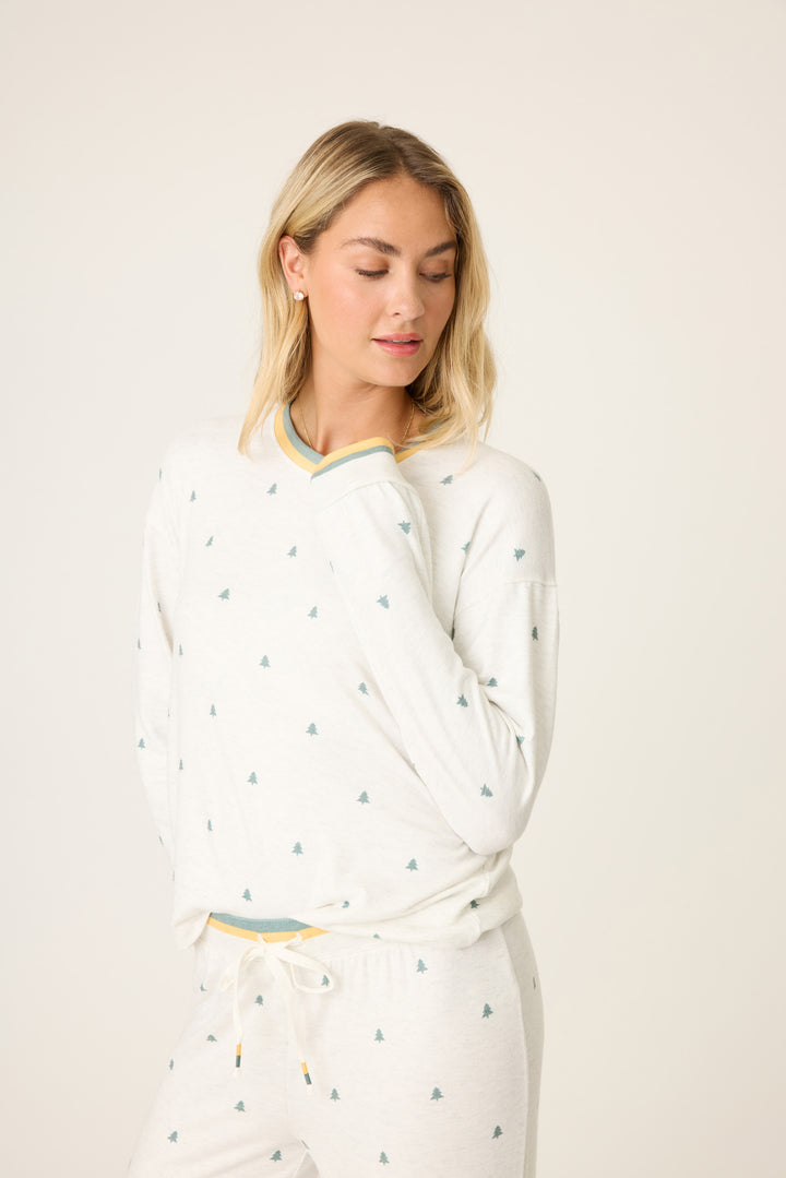 Women's long sleeve heather grey lounge top with mini tree print. Striped sleeve cuffs & open hem