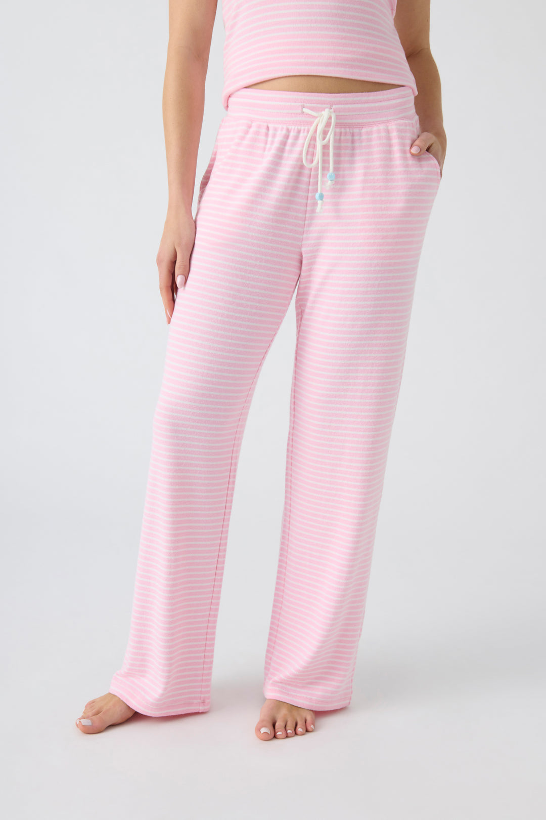 Women's straight leg pajama pant in pink-ivory mini stripe, with contrast tipped drawcord.