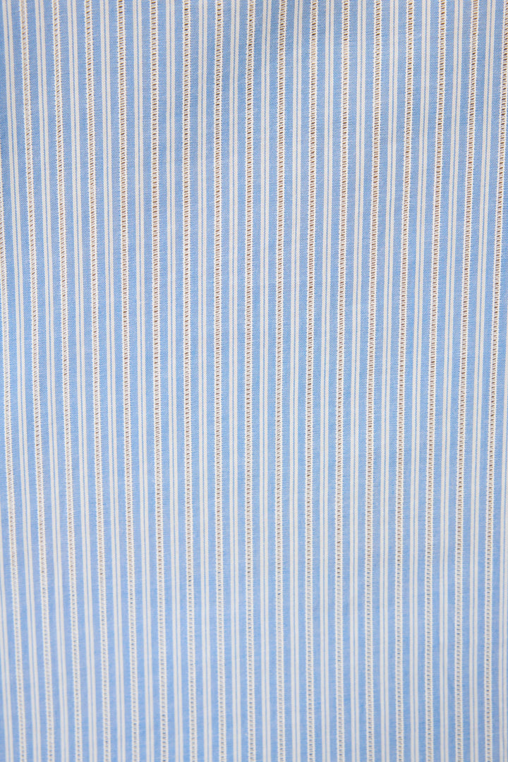 Women's blue & white striped cotton shirt with 3/4 ruffle sleeve. Collar & button-front. Waist length in lightweight woven.