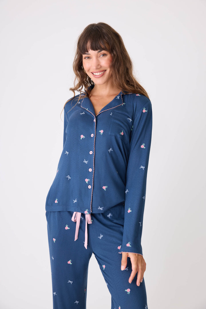 Navy blue with floral pajama top for women with button front & piping. Chest pocket & picot edging.