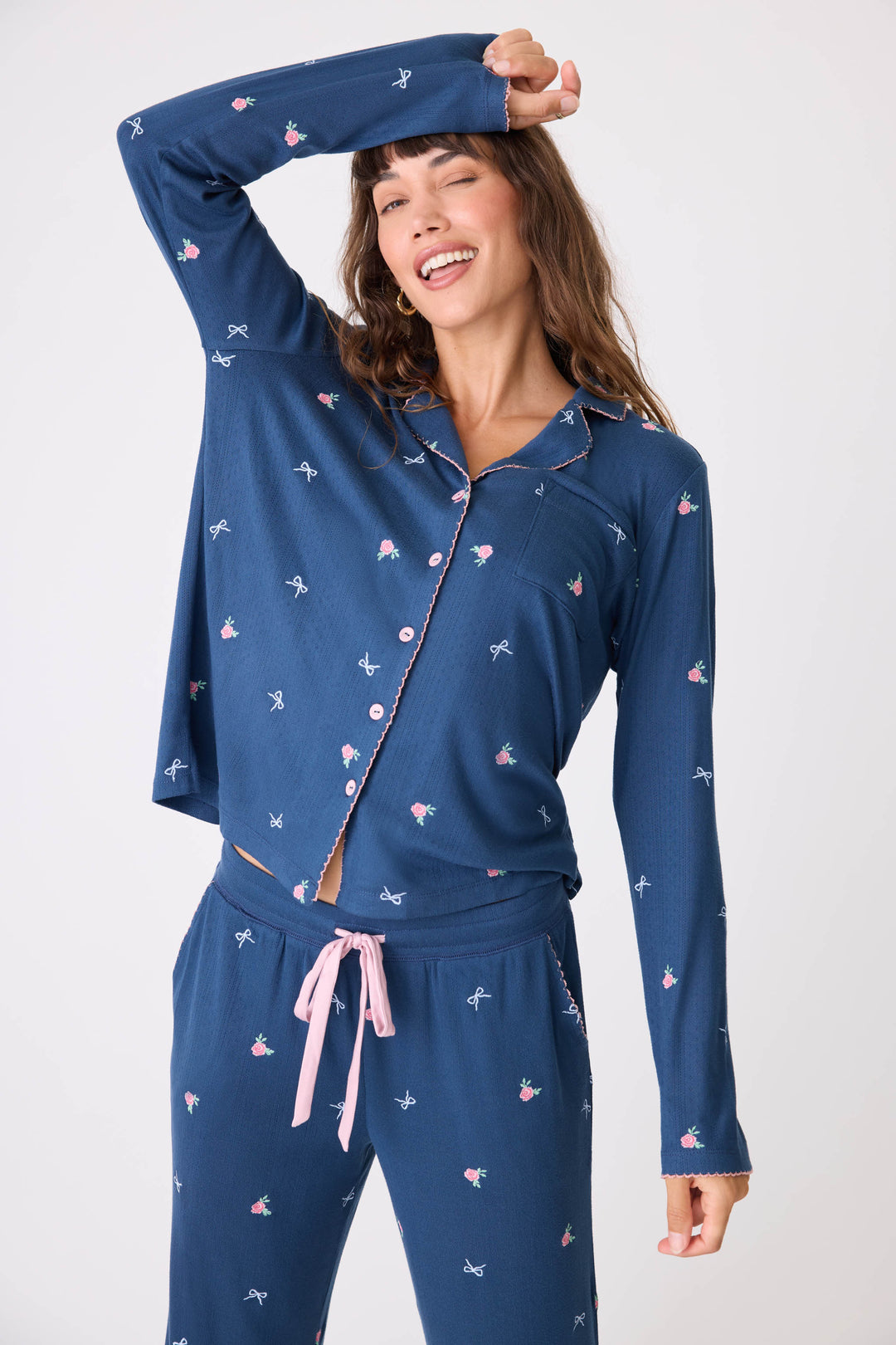 Navy blue with floral pajama top for women with button front & piping. Chest pocket & picot edging.