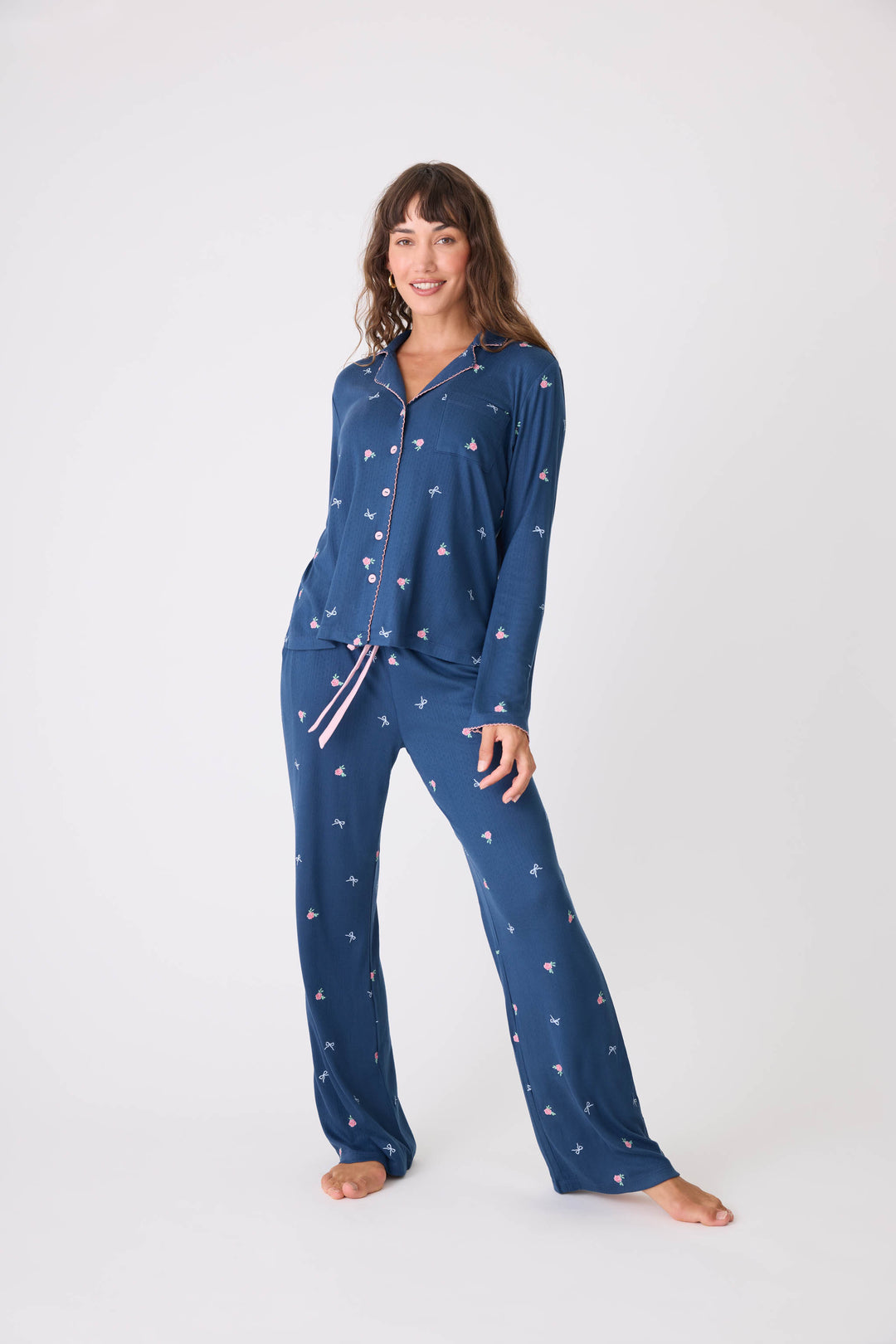Navy blue with floral pajama top for women with button front & piping. Chest pocket & picot edging.