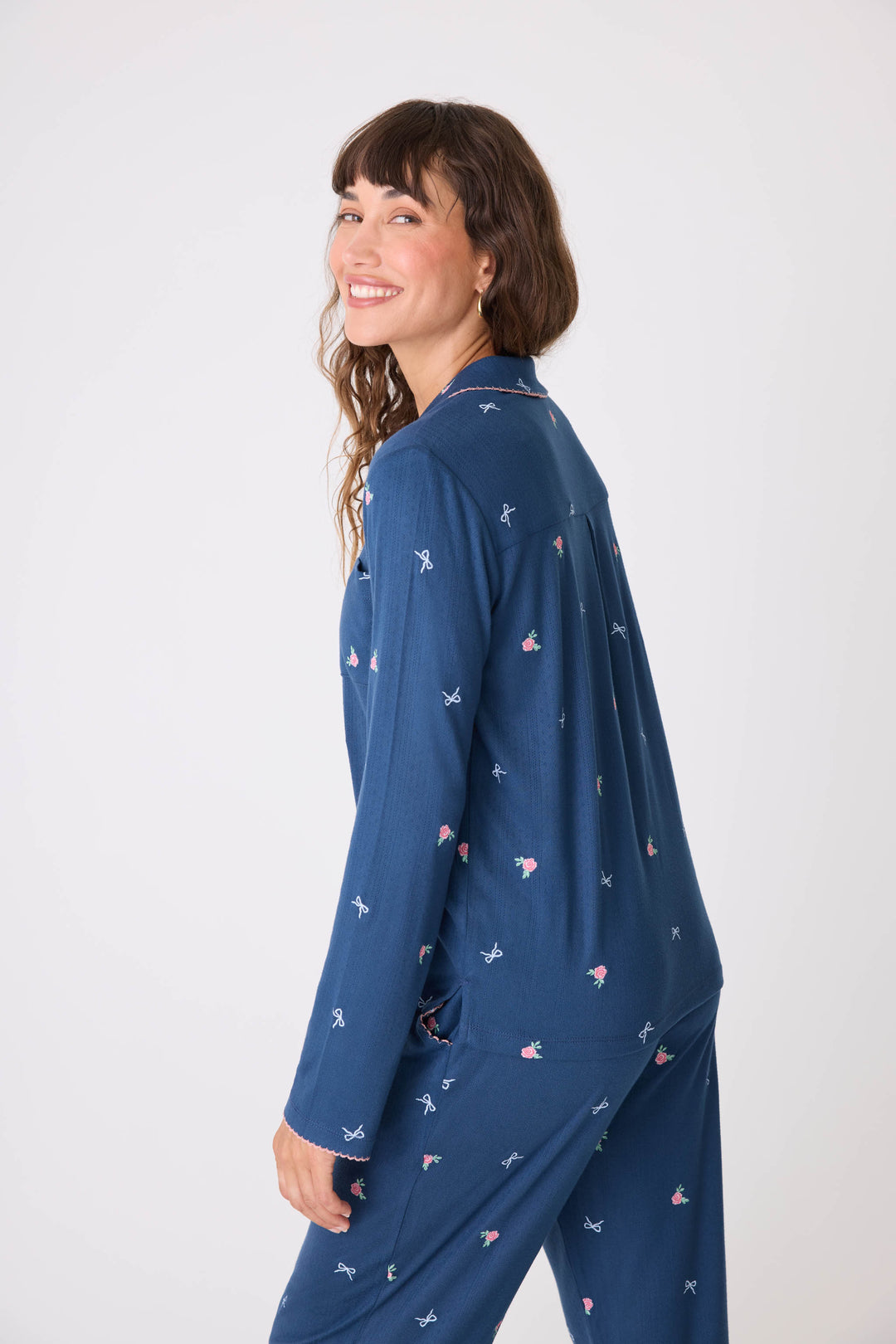 Navy blue with floral pajama top for women with button front & piping. Chest pocket & picot edging.