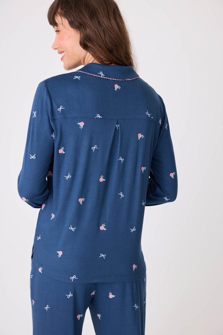 Navy blue with floral pajama top for women with button front & piping. Chest pocket & picot edging.