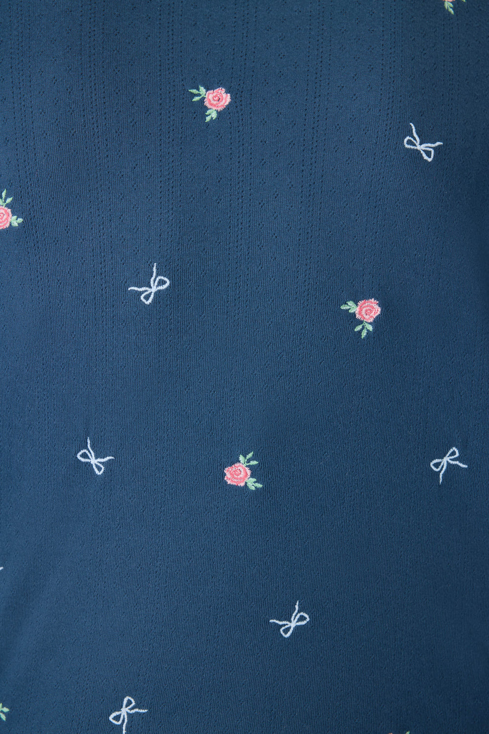 Navy blue with floral sleep short for women. Curved hem with picot edging.