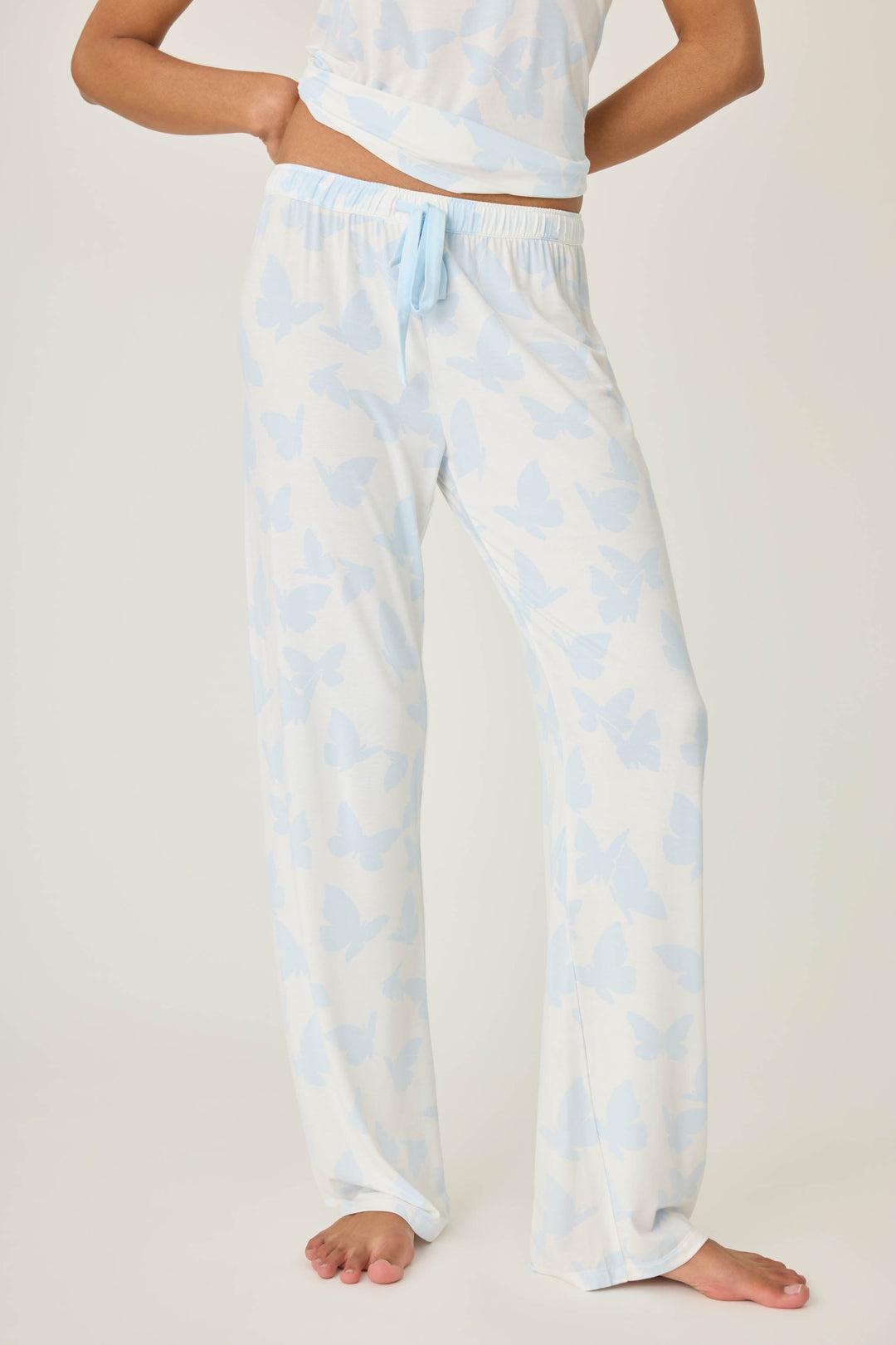 Women's ivory-blue butterfly pj pant in modal jersey. Contrast blue tie-waist band.