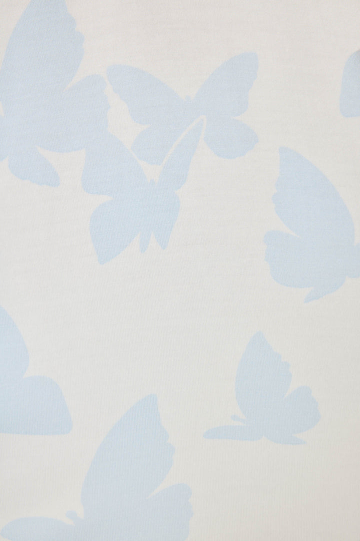 Women's ivory-blue butterfly pj pant in modal jersey. Contrast blue tie-waist band.