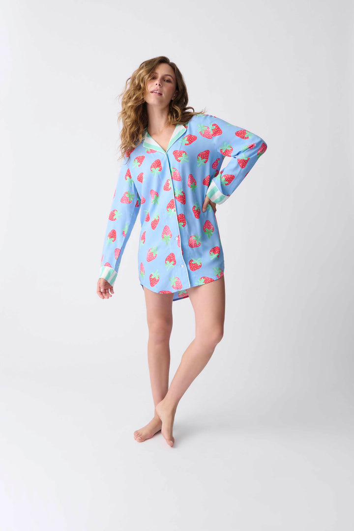 Women's nightshirt in blue with strawberry print in woven rayon sateen. Notch collar with full button-front wtih chest pocket & striped cuffs.
