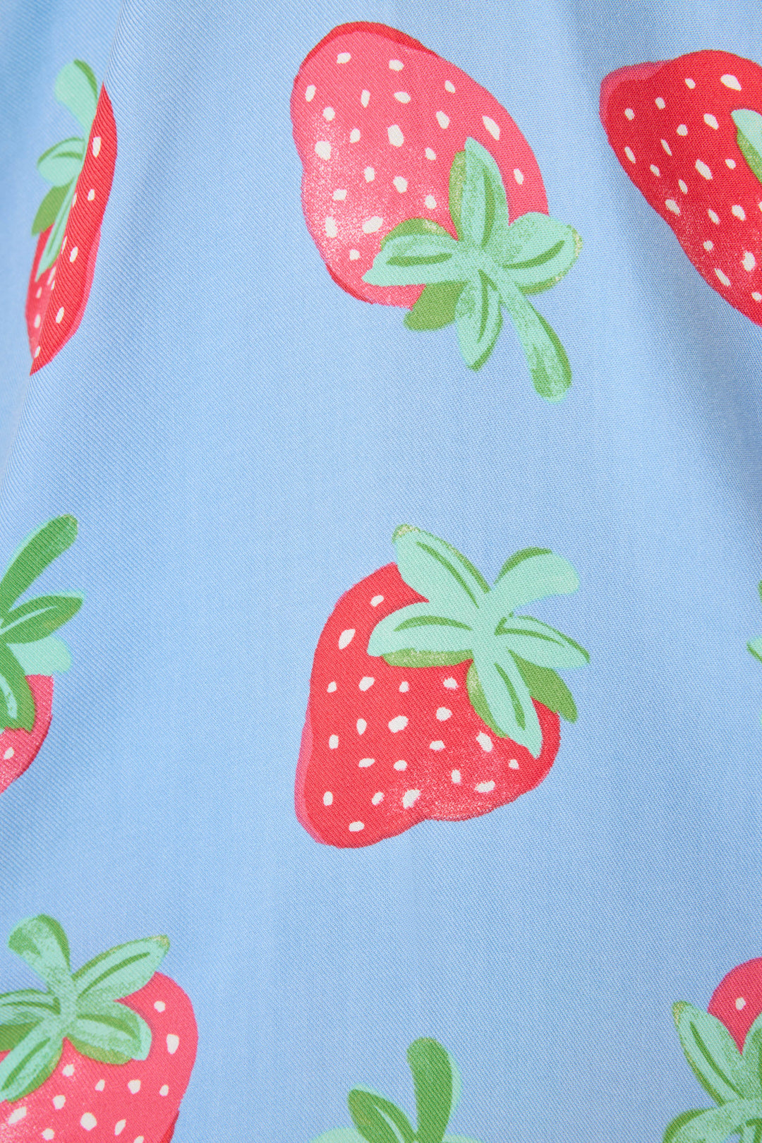 Women's pajama short in blue with strawberry print in woven rayon sateen. Tie-waist.