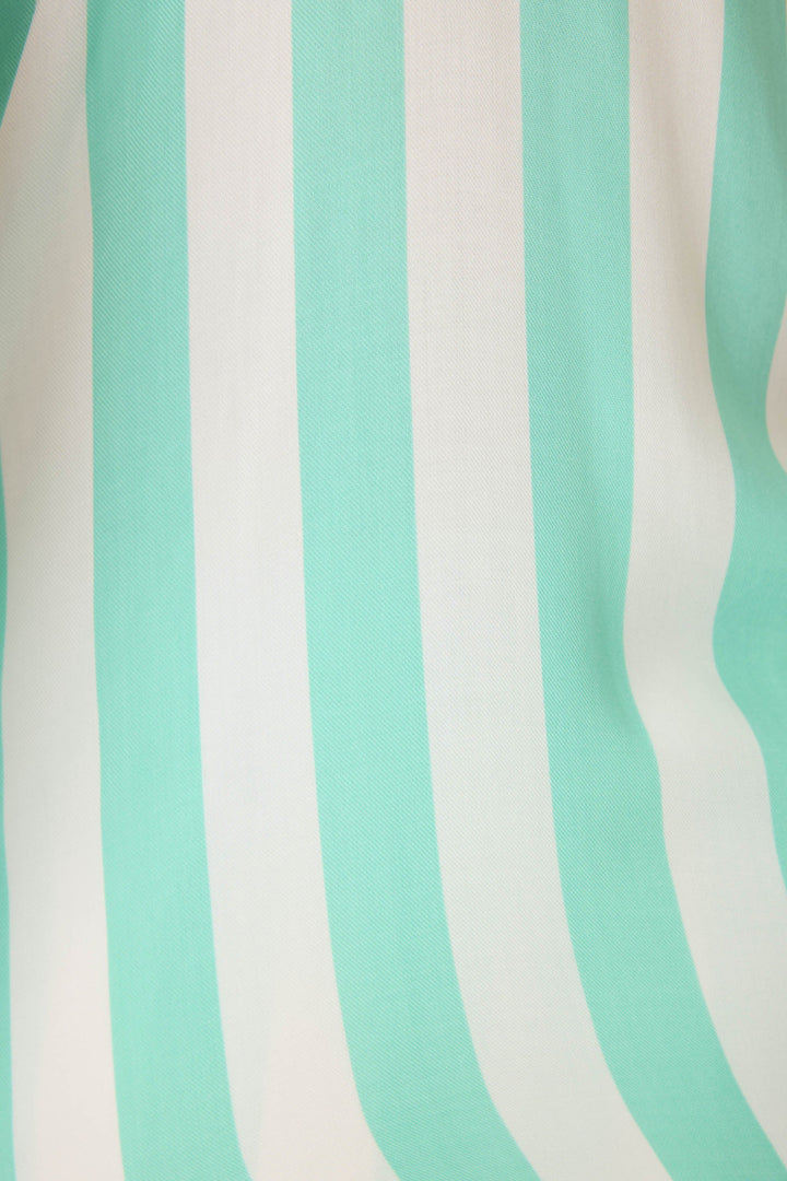 Camisole top for women in ivory-green striped rint. Adjustable strap top & tie wasist short.