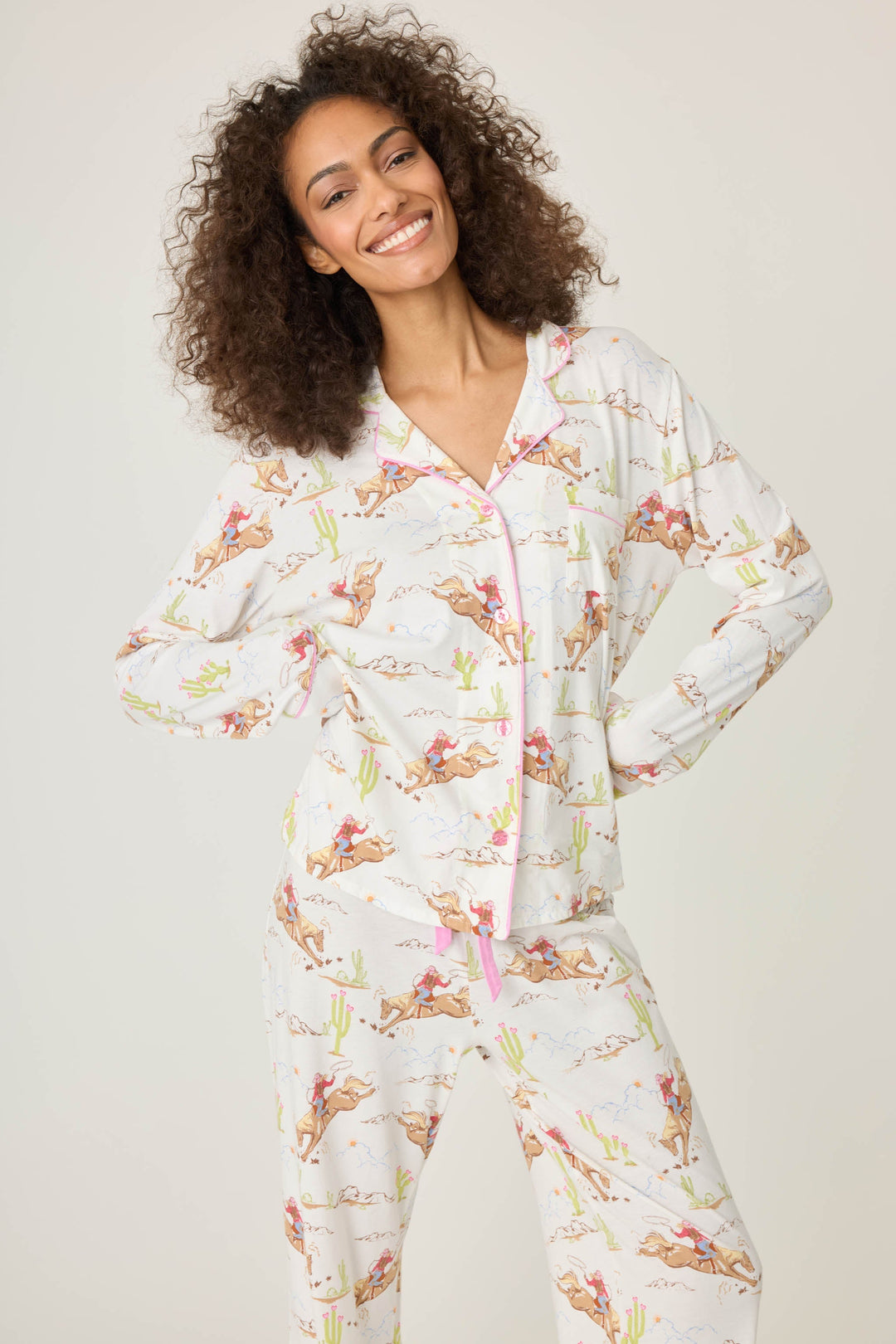 Natural Western print women's pajama top in cotton-blend jersey. Button front with chest pocket.