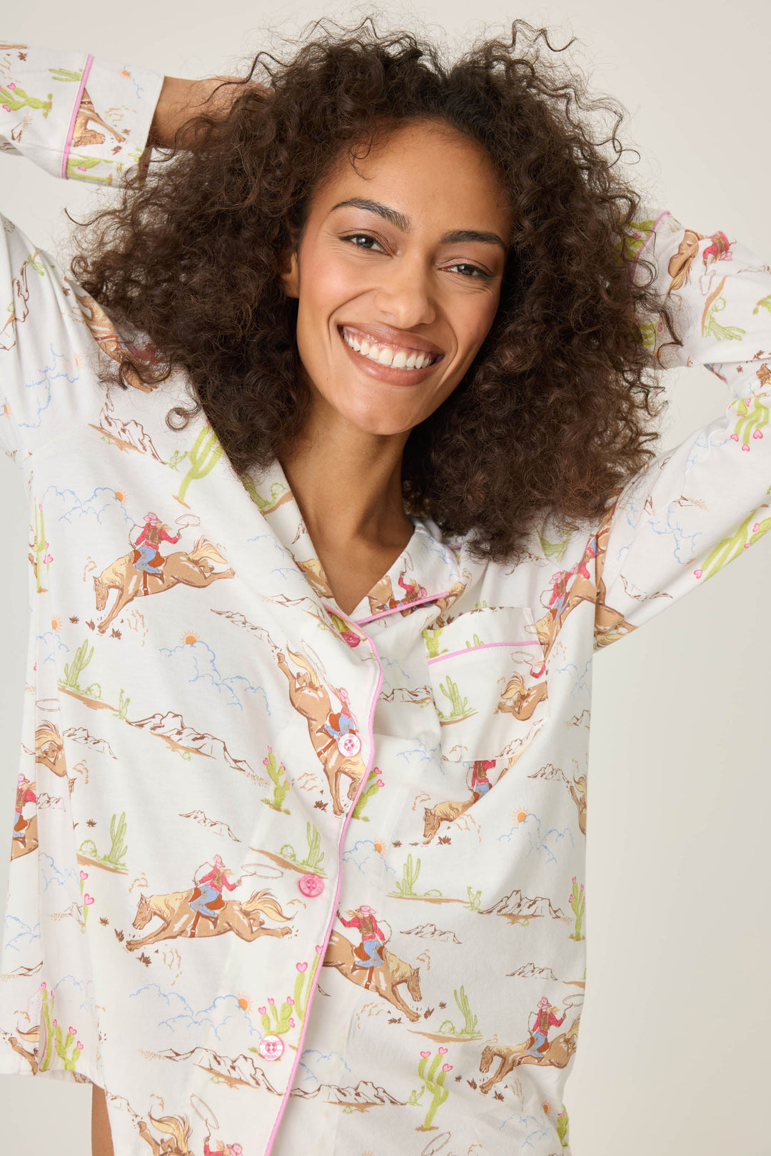 Natural Western print women's pajama top in cotton-blend jersey. Button front with chest pocket.
