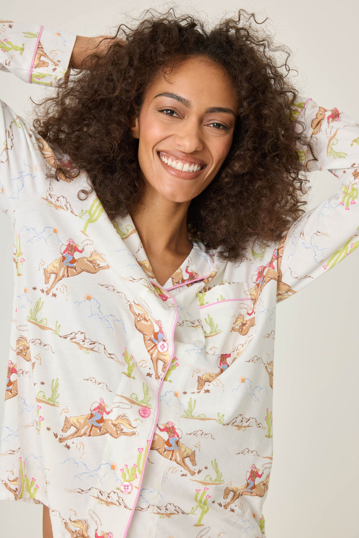 Natural Western print women's pajama top in cotton-blend jersey. Button front with chest pocket.