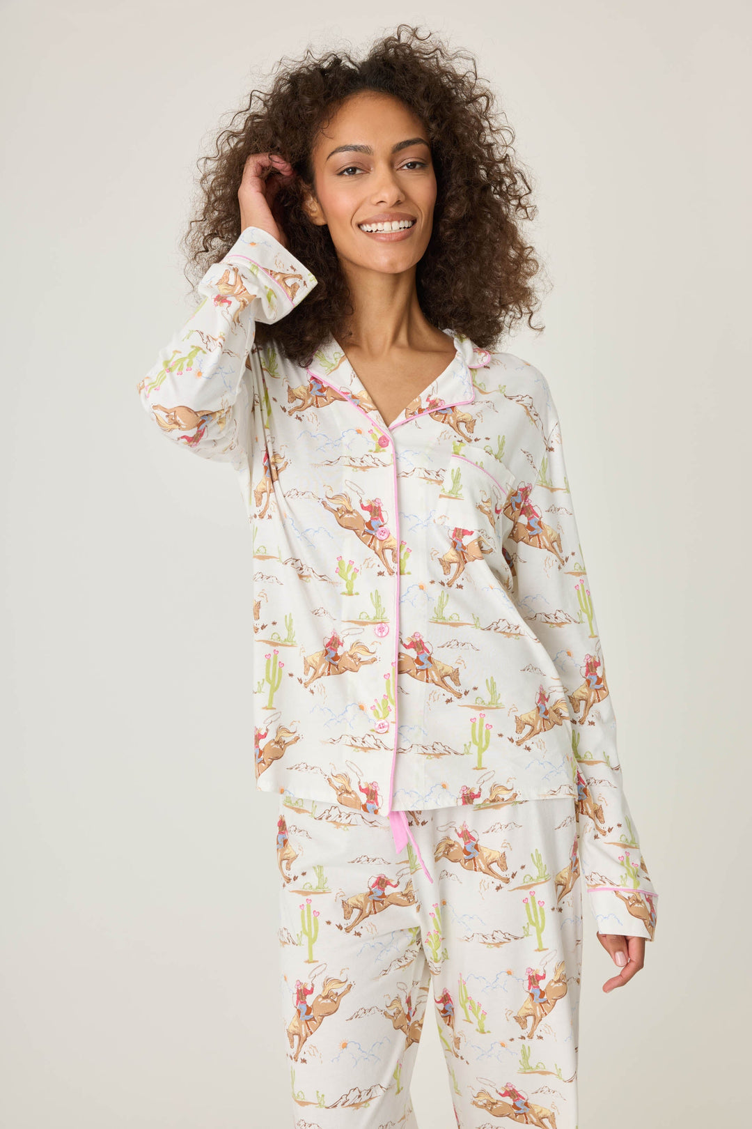 Natural Western print women's pajama top in cotton-blend jersey. Button front with chest pocket.