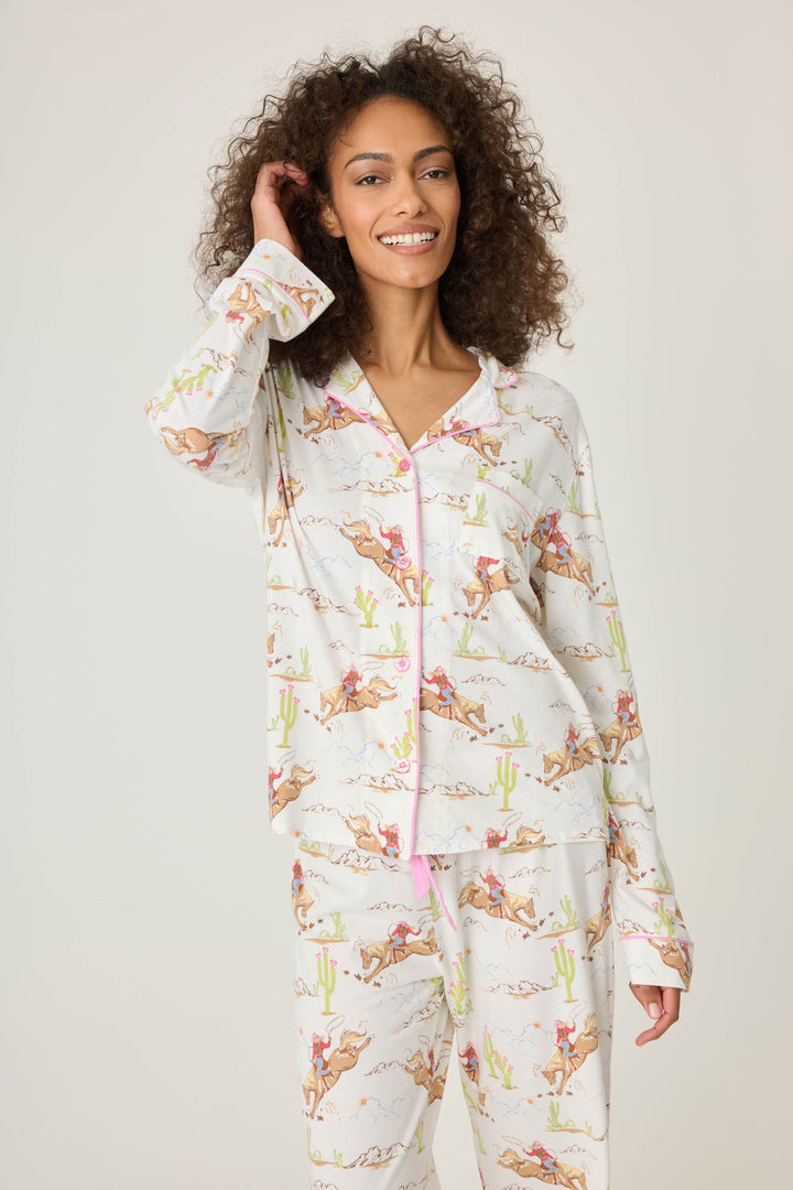 Natural Western print women's pajama top in cotton-blend jersey. Button front with chest pocket.