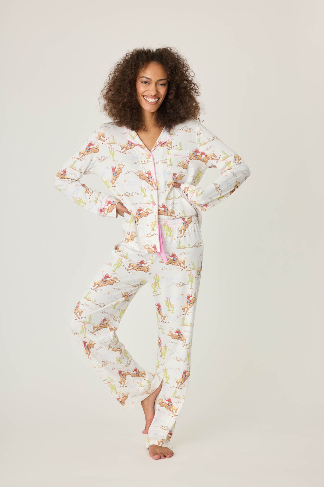 Natural Western print women's pajama top in cotton-blend jersey. Button front with chest pocket.