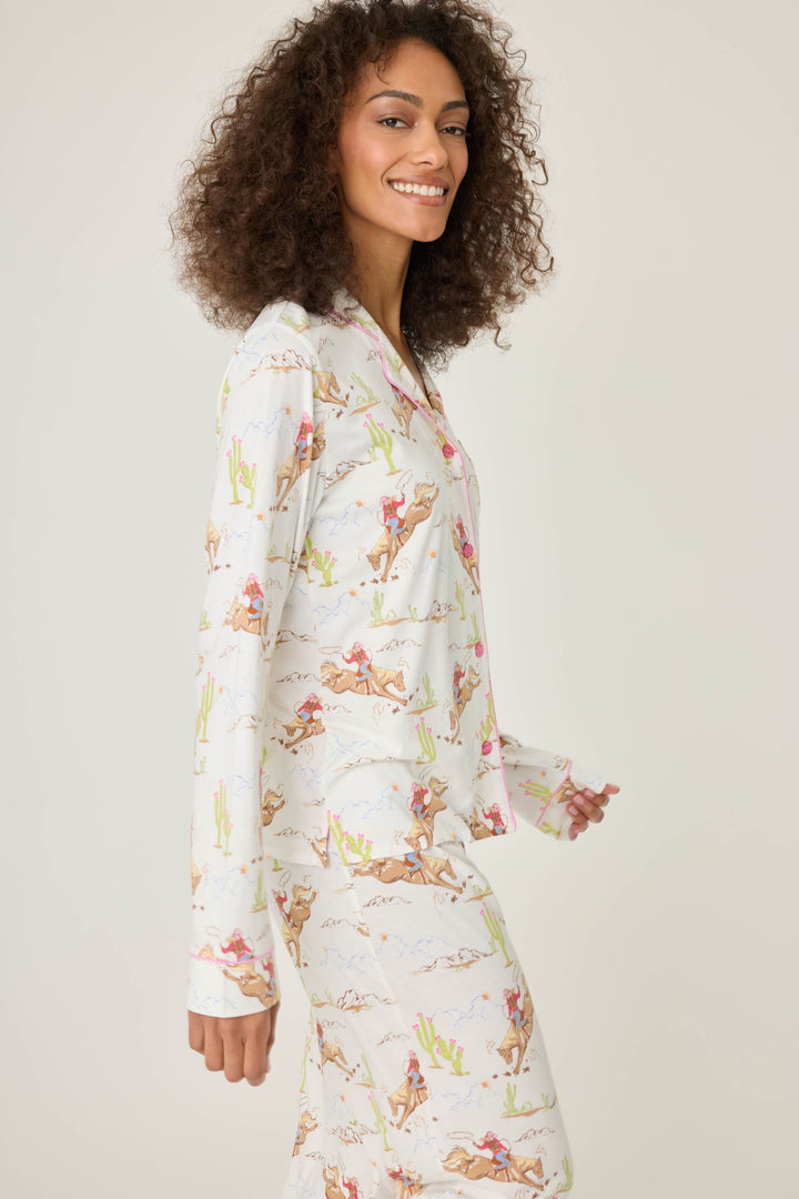 Natural Western print women's pajama top in cotton-blend jersey. Button front with chest pocket.