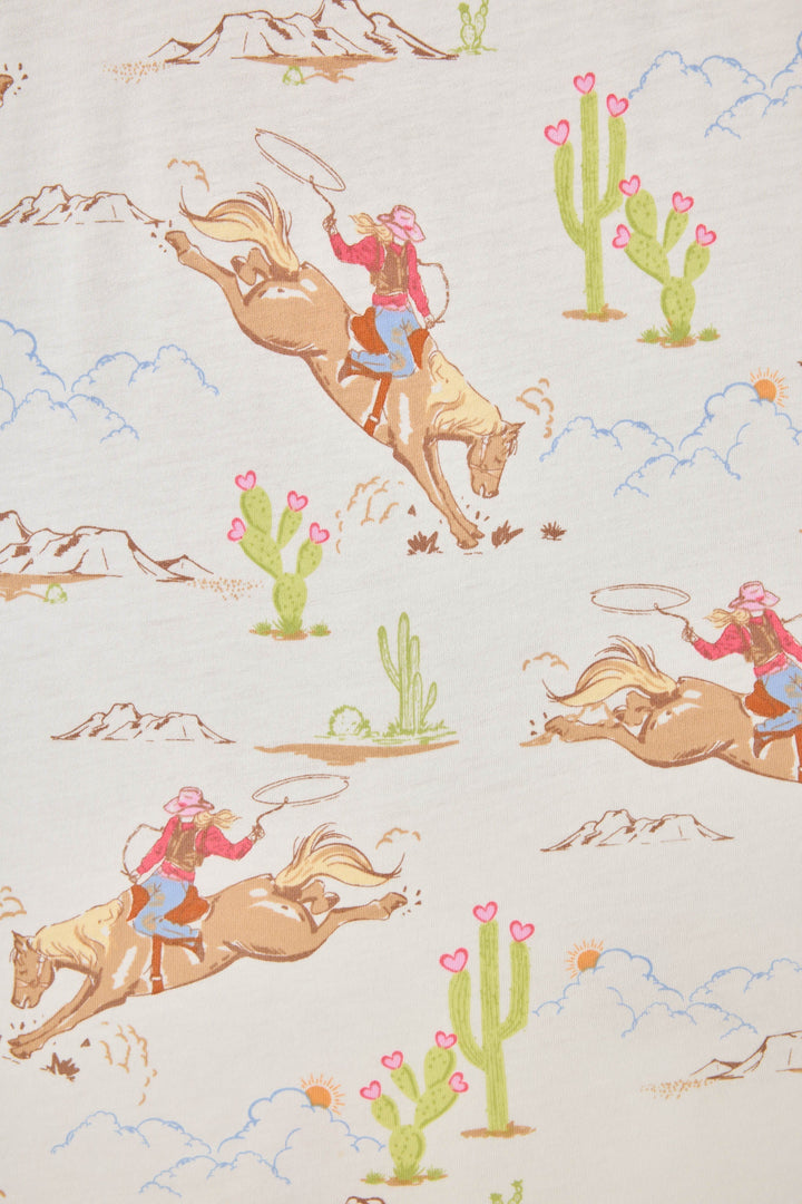 Natural Western print women's pajama top in cotton-blend jersey. Button front with chest pocket.