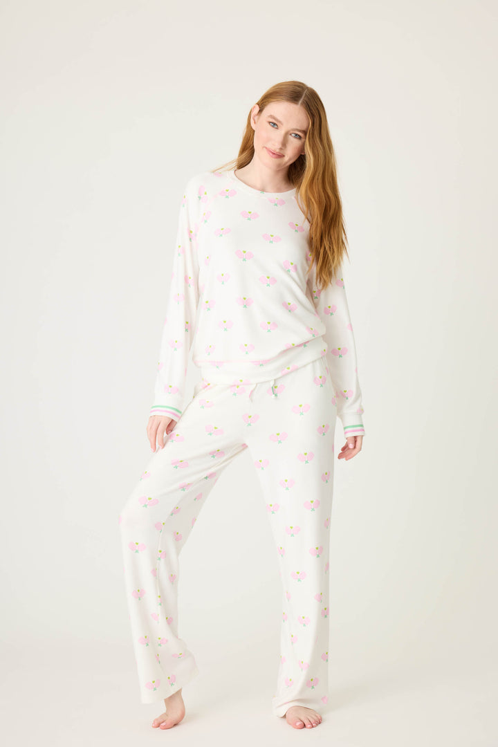 Pickleball racket-printed lounge top for women in ivory-pink. Raglan sleeves & banded hem.