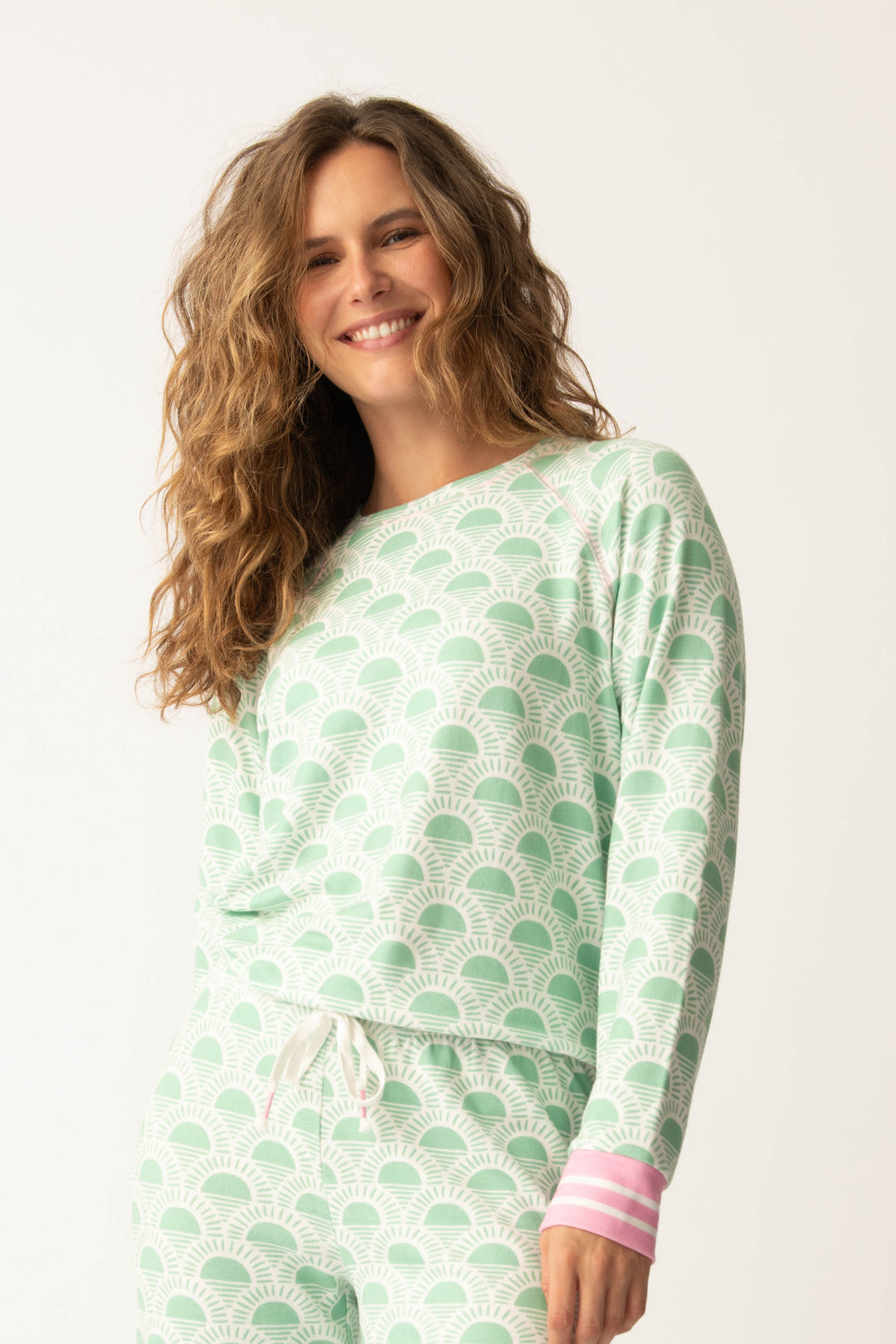 Women's spring racket-sun printed lounge top in ivory-green pattern, with striped pink cuffs.