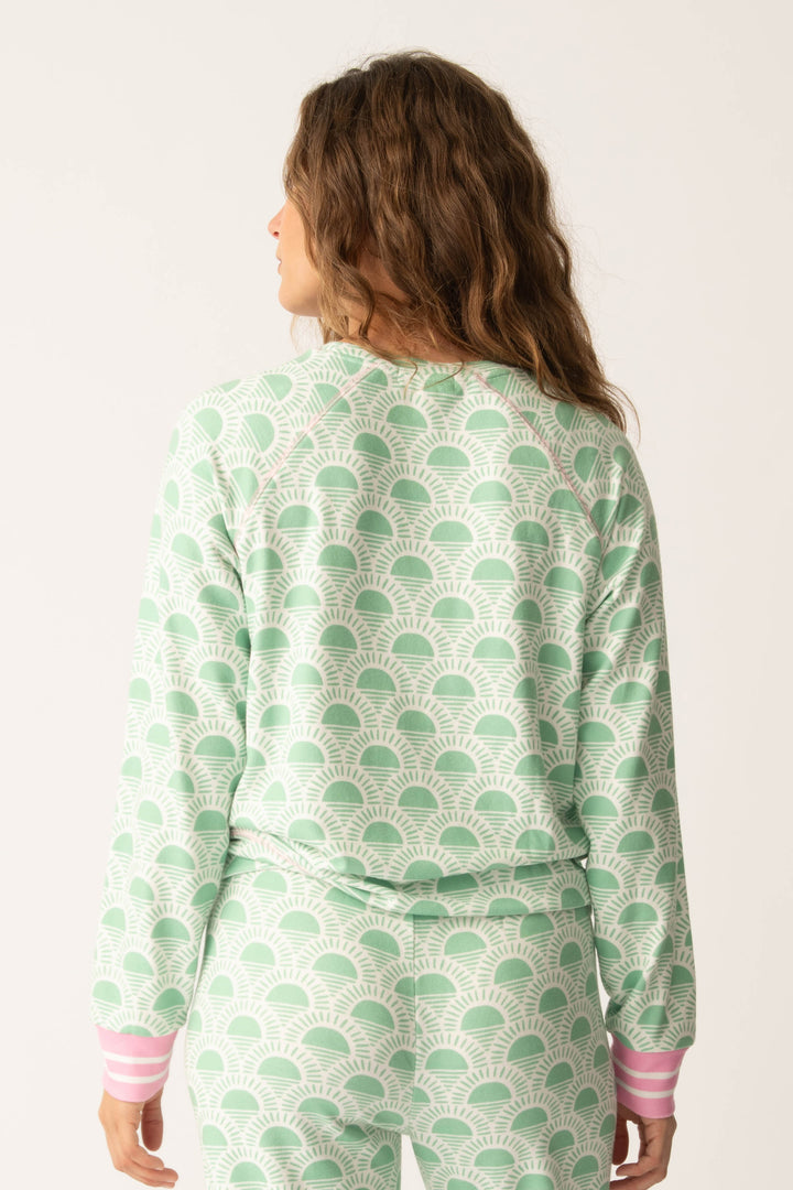 Women's spring racket-sun printed lounge top in ivory-green pattern, with striped pink cuffs.