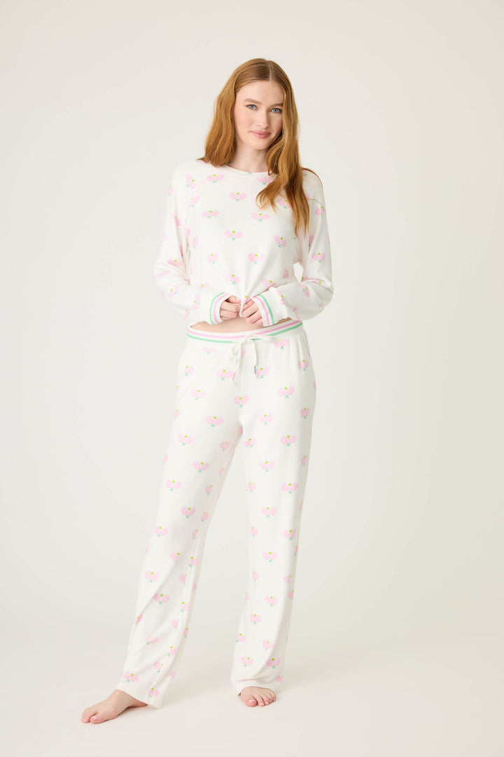 Pickleball racket-printed lounge pant for women in ivory-pink. Side pockets & striped waistband.