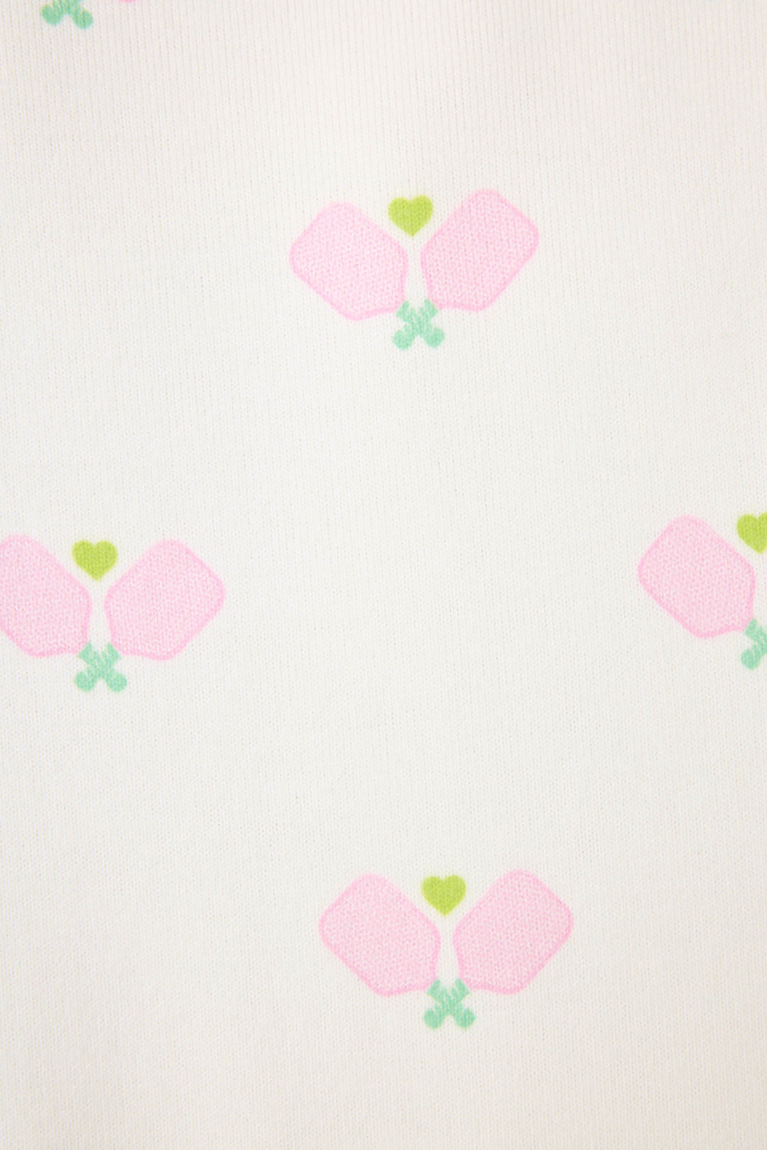 Women's racer back tank top in ivory-pink racket printed peachy with pink & green contrast binding.