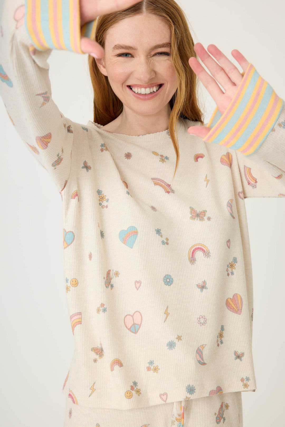 Emoji-fun tattoo printed lounge top in oatmeal with multi-color striped cuffs.