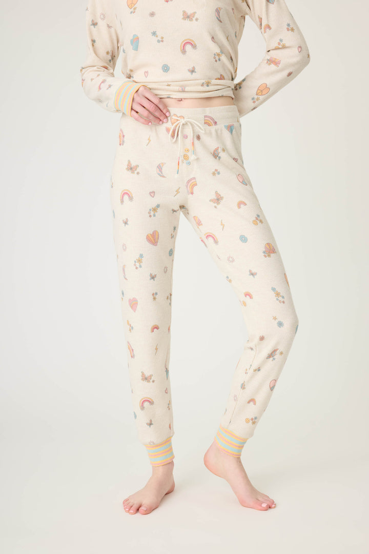 Emoji-fun tattoo printed jammie pant in oatmeal with multi-color striped cuffs.