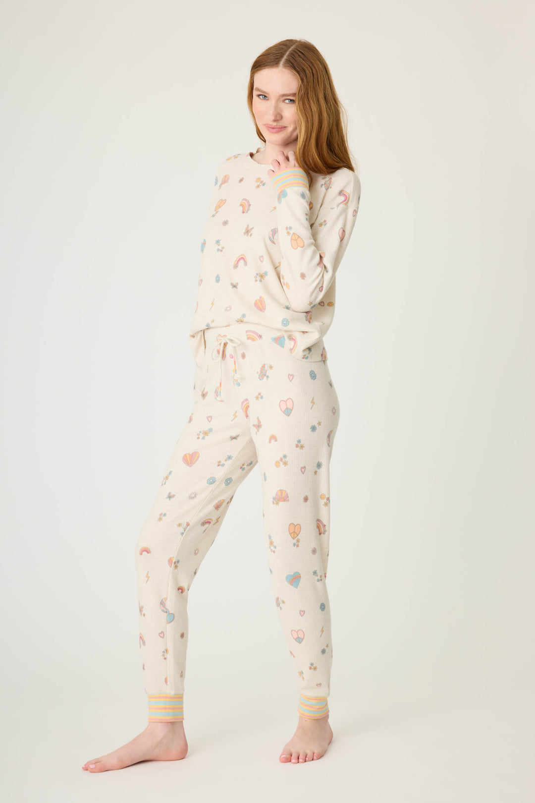 Emoji-fun tattoo printed jammie pant in oatmeal with multi-color striped cuffs.