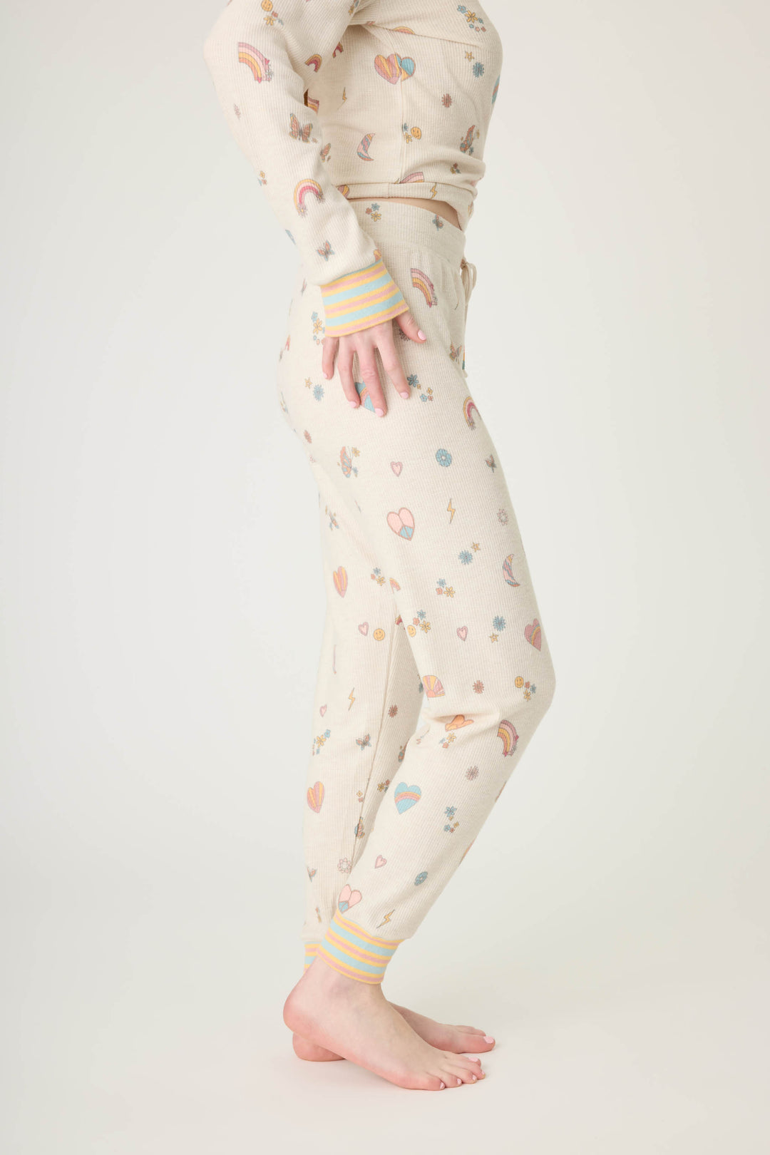 Emoji-fun tattoo printed jammie pant in oatmeal with multi-color striped cuffs.