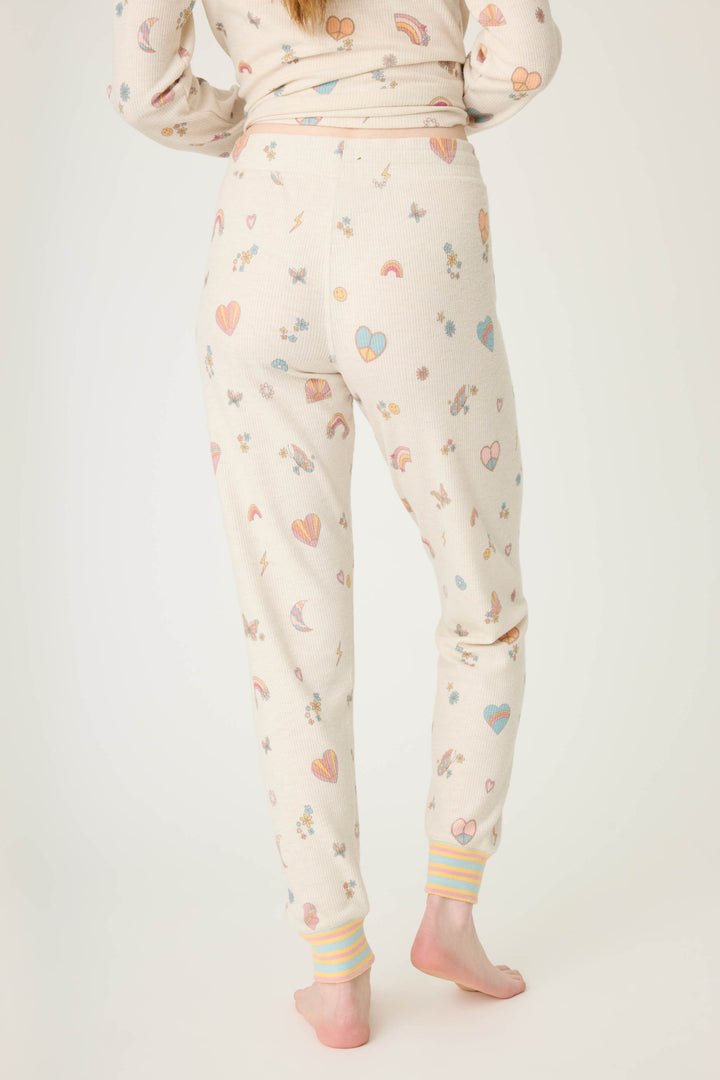 Emoji-fun tattoo printed jammie pant in oatmeal with multi-color striped cuffs.