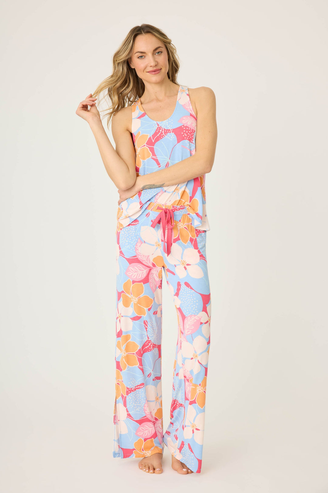 Women's tropical pink & coral floral printed lounge pant in modal jersey. Wide leg with side slits.