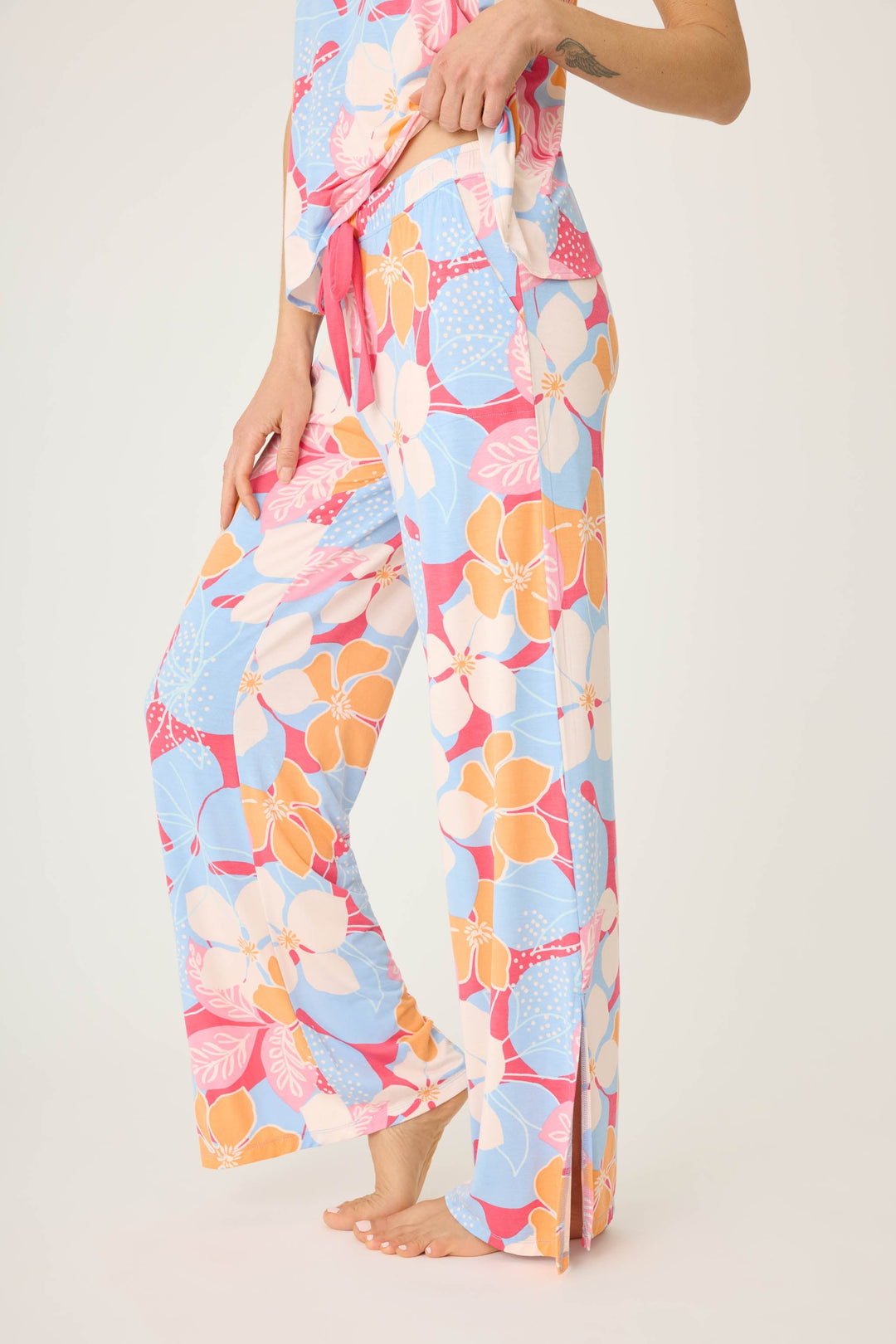 Women's tropical pink & coral floral printed lounge pant in modal jersey. Wide leg with side slits.