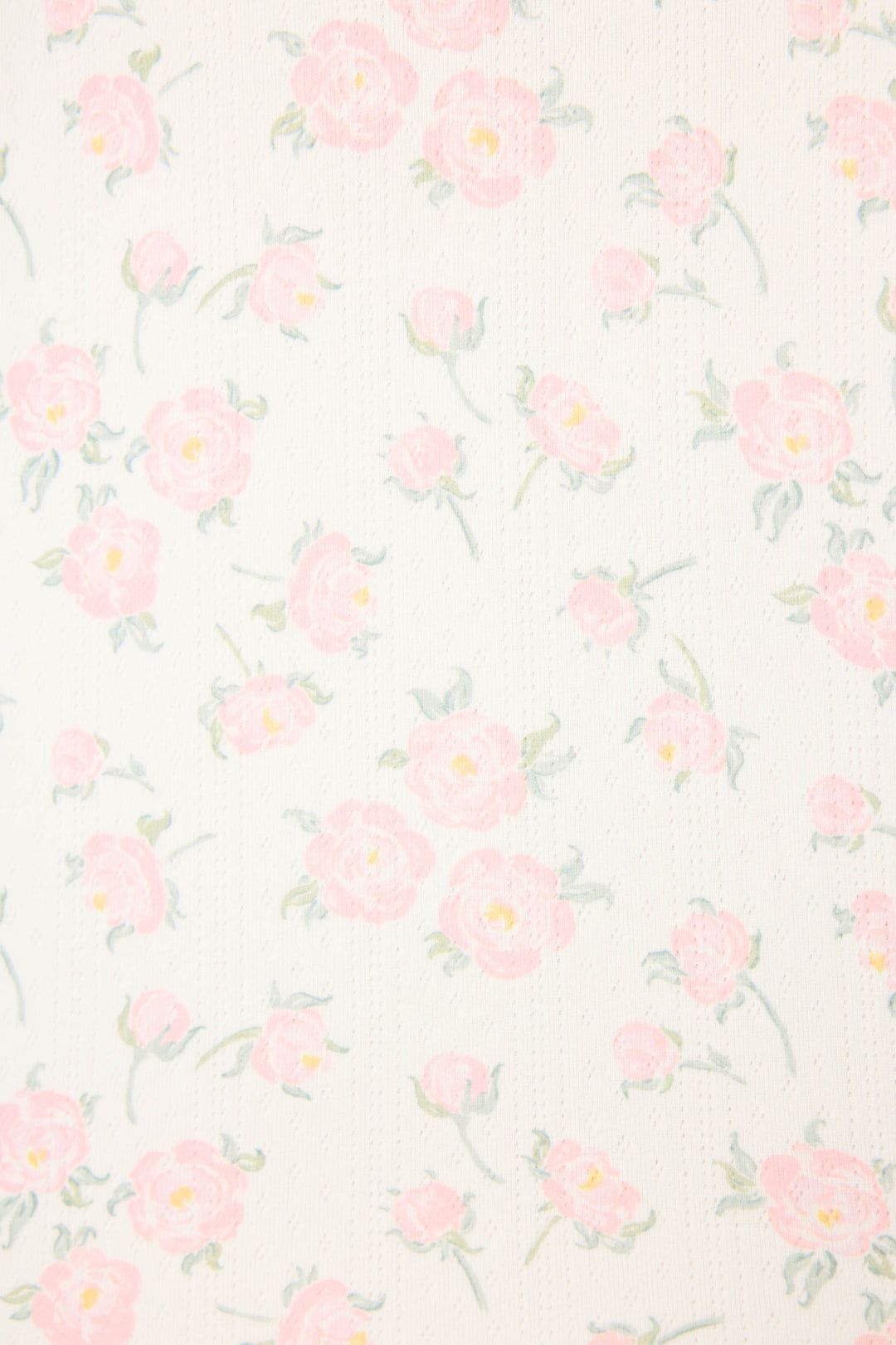 The Ivory Floral Print Henley PJ Set by P.J. Salvage features a soft ivory background with a vintage-inspired pattern of light pink flowers and green leaves, creating a delicate and cozy look.