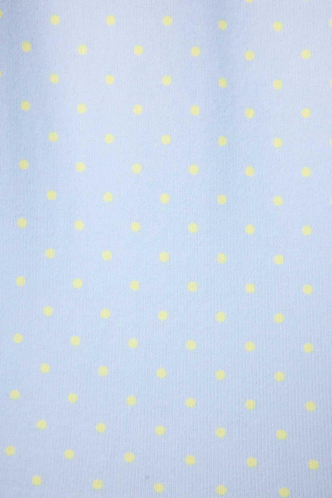 The P.J. Salvage Beautiful Life Polka Dot Shorts feature light blue fabric with evenly spaced small yellow polka dots and a subtly visible texture.
