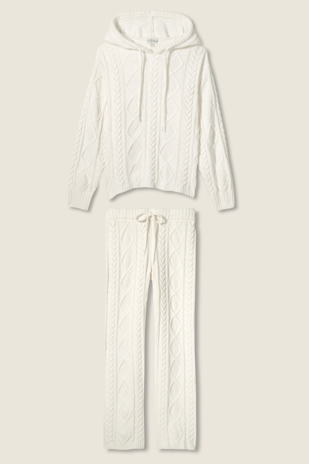 The SOLID PJ SET COZY CHENILLE CABLE KNIT by P.J. Salvage features a cream cable-knit hooded zip-up sweater with drawstrings and matching drawstring pants, both laid flat on a neutral background.