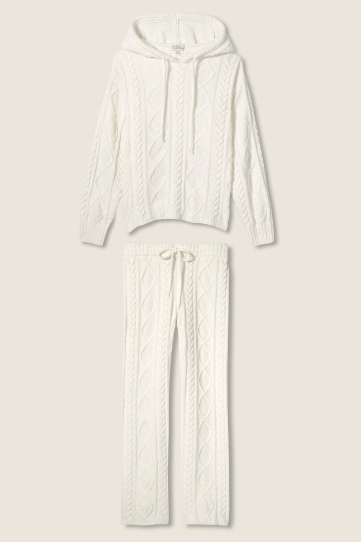 The SOLID PJ SET COZY CHENILLE CABLE KNIT by P.J. Salvage features a cream cable-knit hooded zip-up sweater with drawstrings and matching drawstring pants, both laid flat on a neutral background.