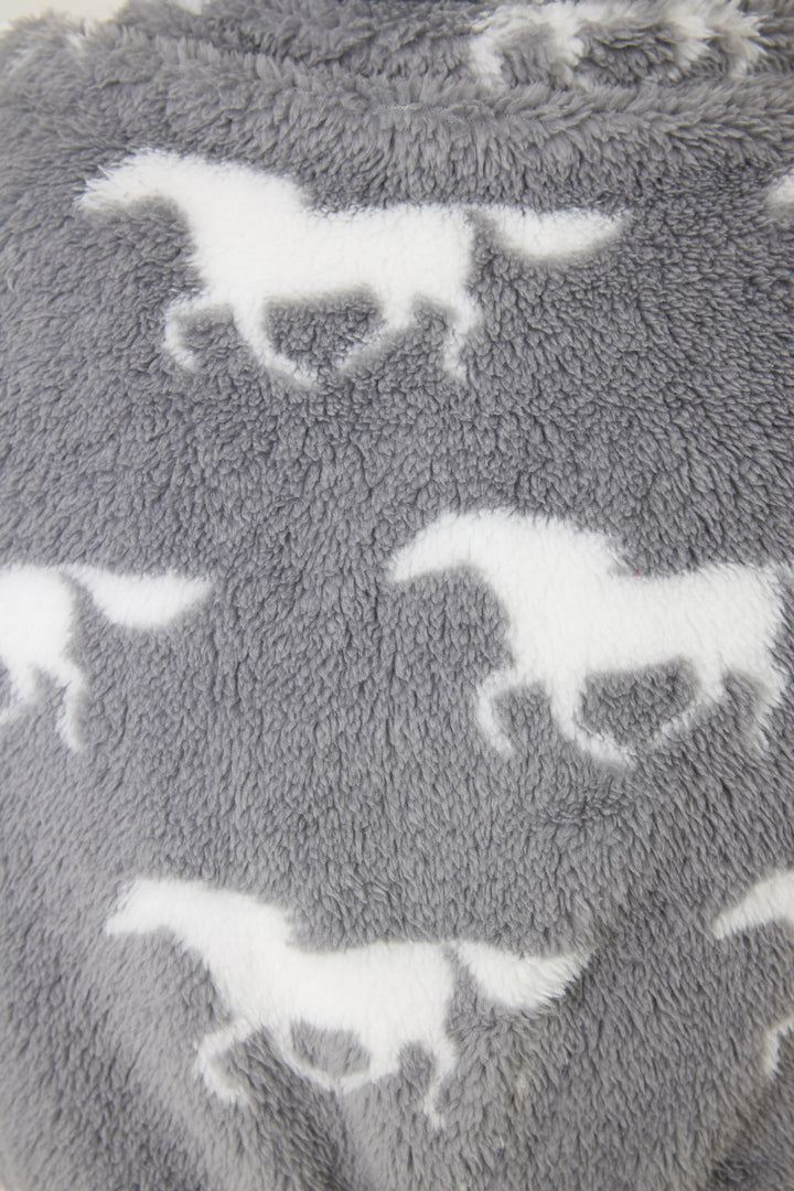 Close-up of the STARS ROBE ROBE LETS GET COZY by P.J. Salvage: soft, gray, fuzzy fabric with a repeated pattern of white running horse silhouettes.