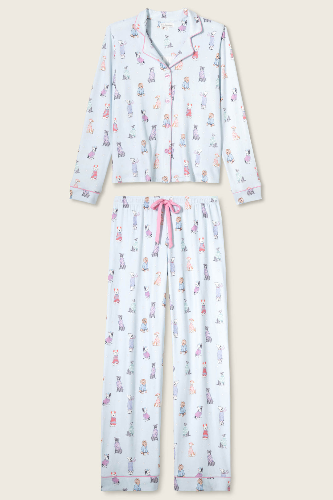 The P.J. Salvage Doggone Cold Dog Print Pointelle Plus Size PJ Set features light blue, button-up long-sleeve top and pants with colorful dog prints, pink piping trim, and a pink drawstring waistband.
