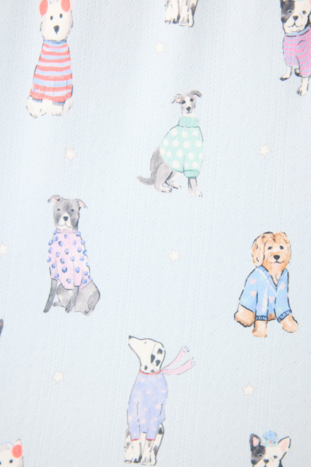 The Doggone Cold Dog Print Pointelle Shorts by P.J. Salvage feature illustrated dogs in colorful sweaters on a light background with scattered stars.